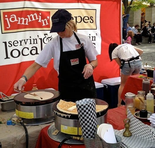 Kim Rizk busy at work preparing crepes at Communiversity.