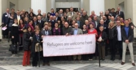 Nassau Presbyterian Church Celebrates Return of Banner Welcoming Refugees