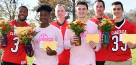 Celebrating kindness: Lawrence High football team raises money to lift spirits of women battling breast cancer