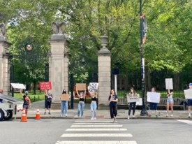 Area students protest racism and police brutality in front of Princeton University gates